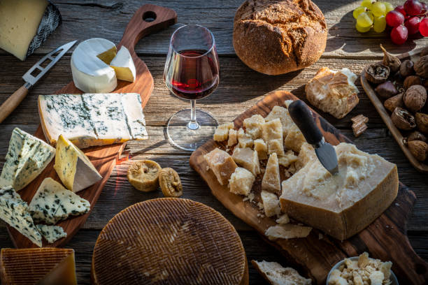 Blue cheese manchego and parmigliano reggiano with wine assorted table